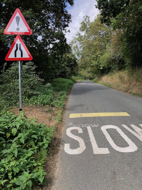 Road signs near Golf Course